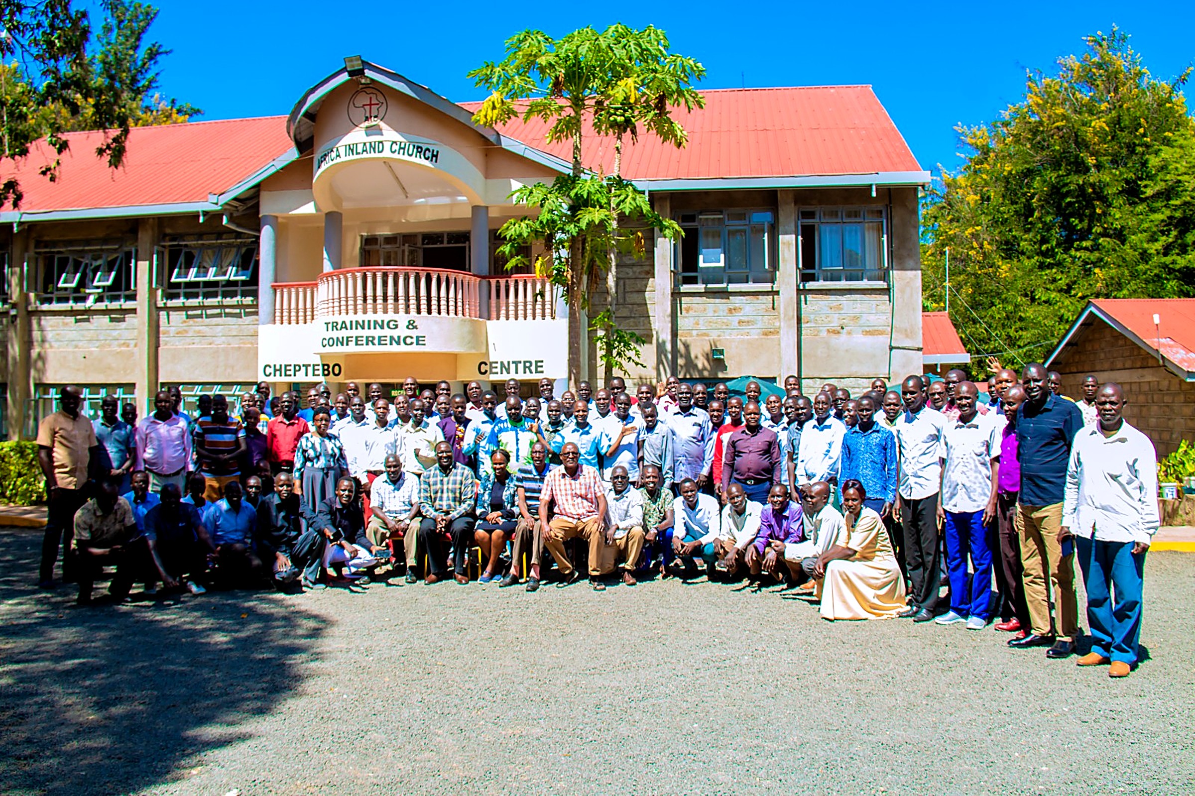 Large group of pastors and church leaders gathered at a training and conference centre